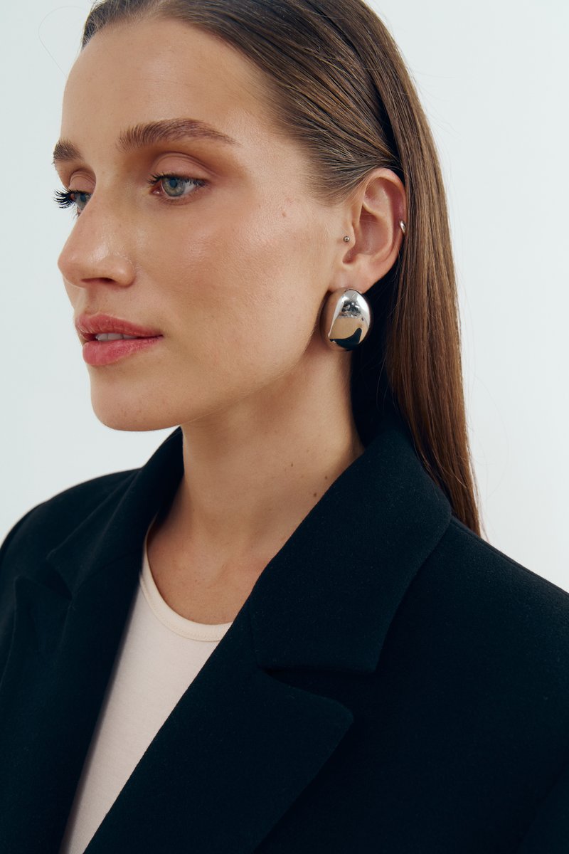 

Сріблясті овальні сережки металік