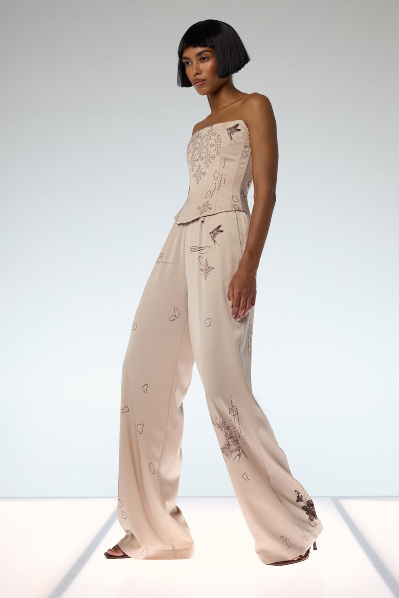 

Бежеві сатинові штани з принтом Душа