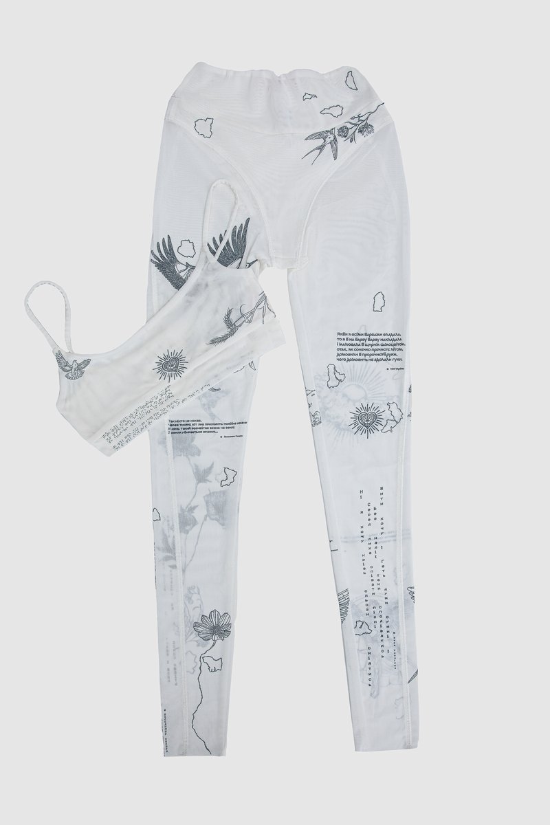 

Молочний комплект із топа і легінсів зі стрейч-сітки