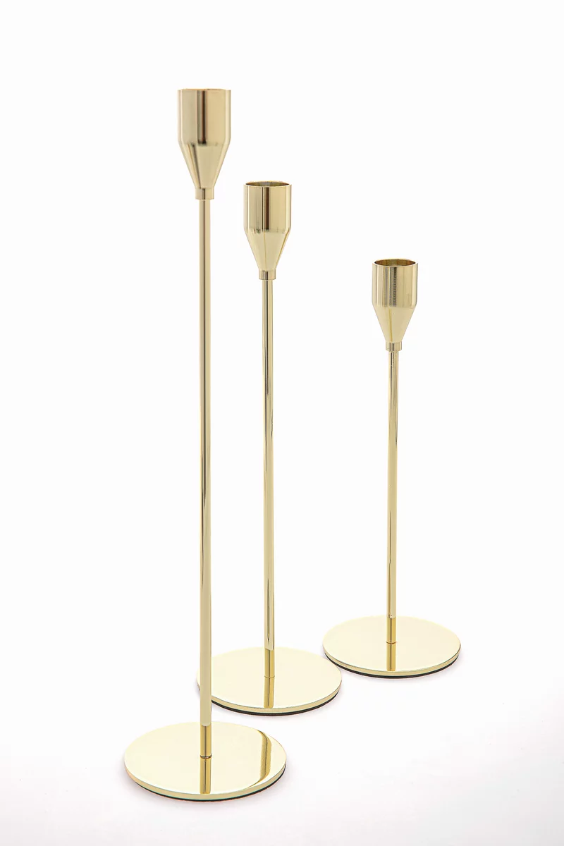 Золотистый набор из трех подсвечников фотография 3