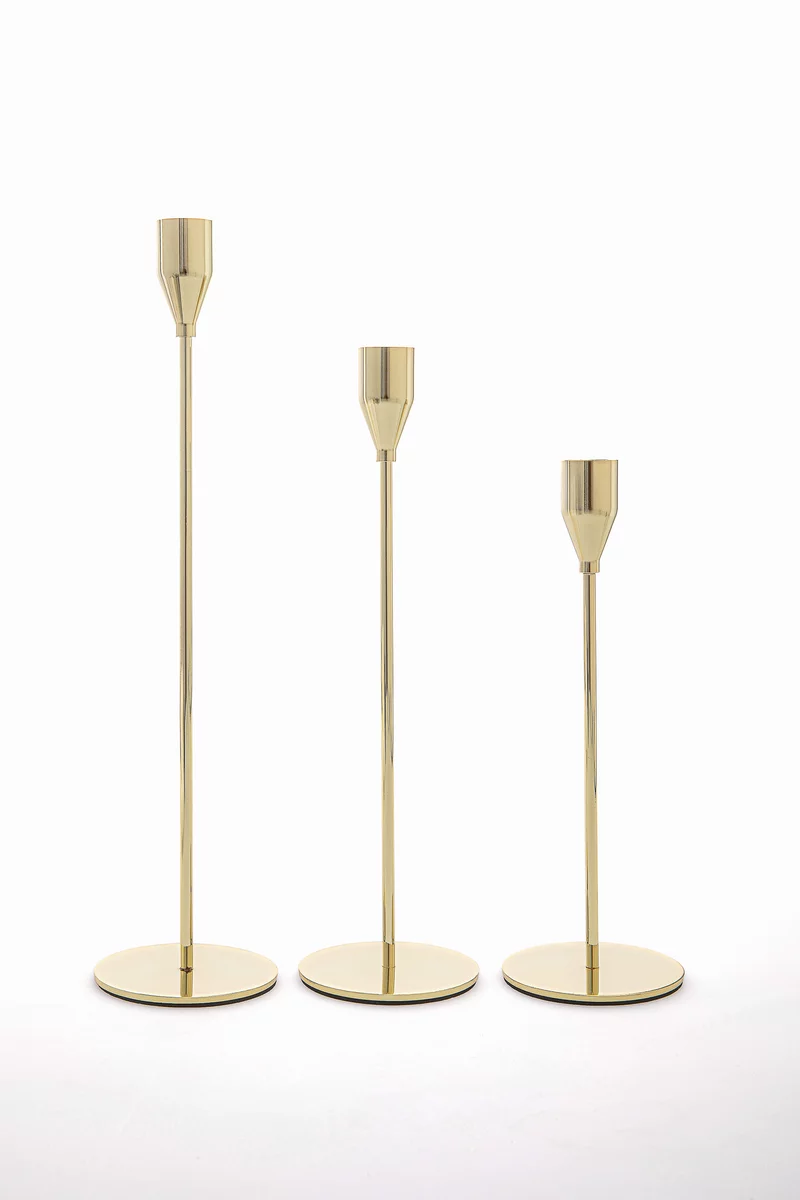 Золотистый набор из трех подсвечников фотография 5