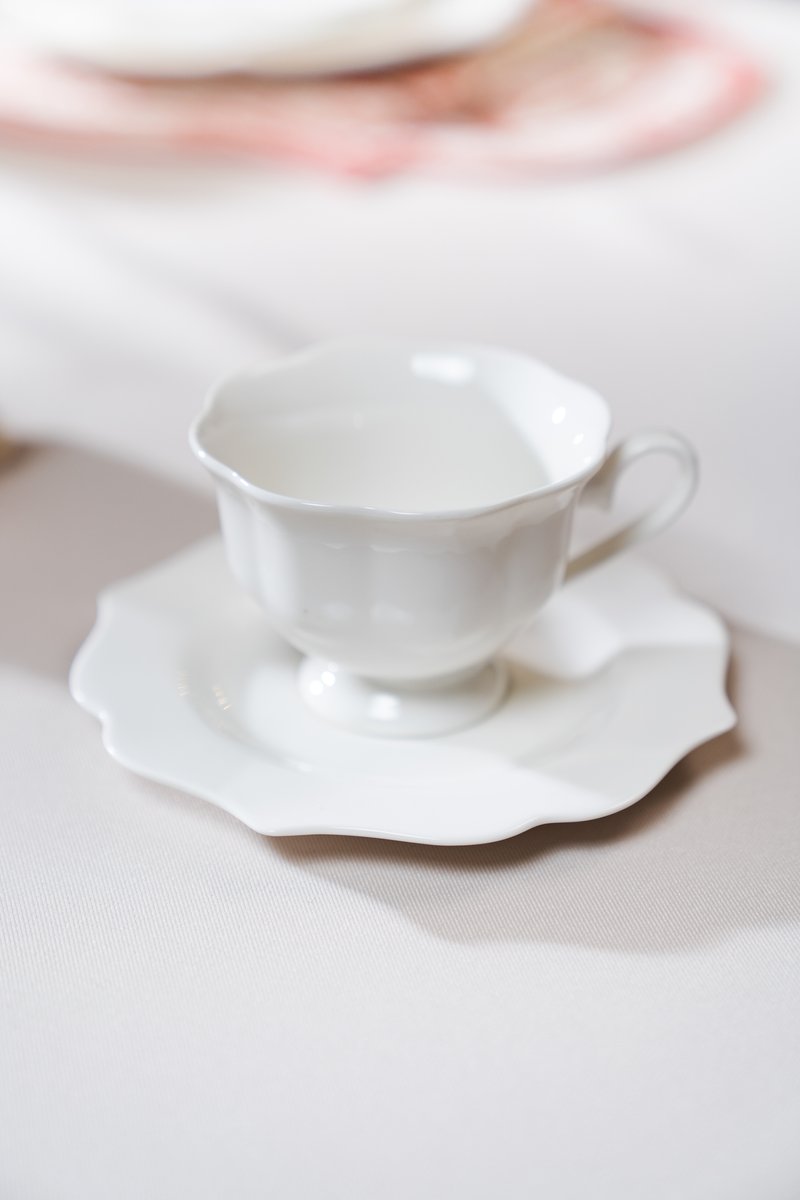 Milk porcelain cup and saucer set image 1