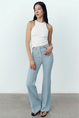 Голубые джинсы-клеш с высокой посадкой