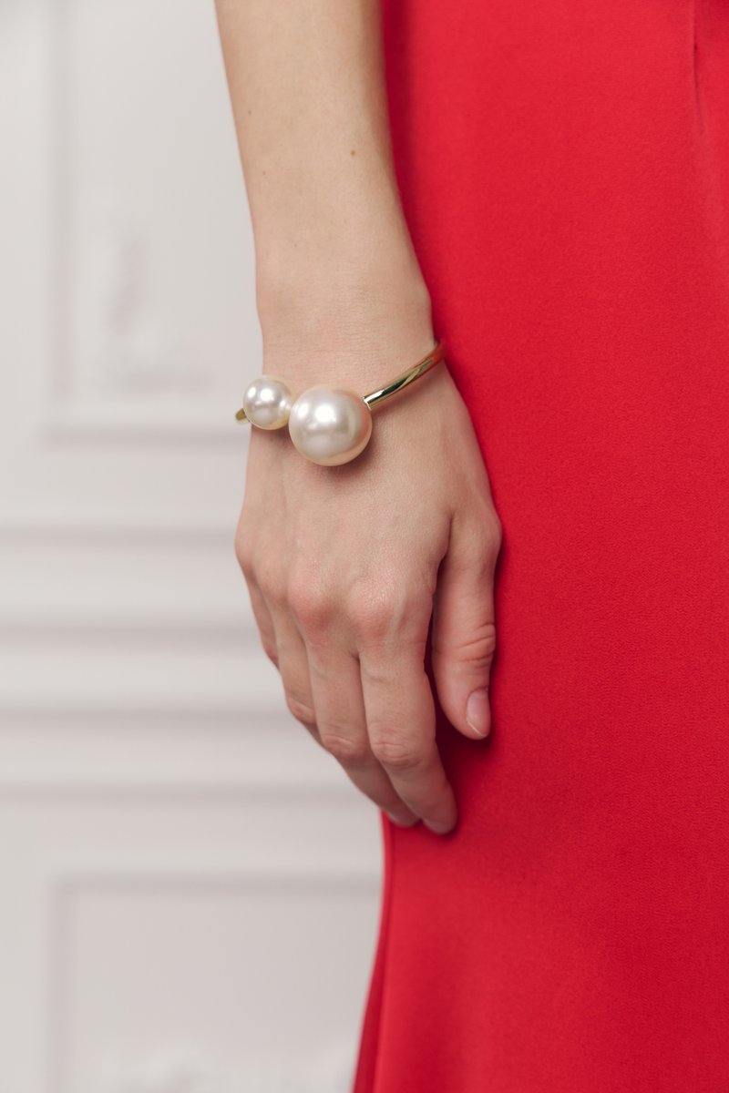 Золотистый браслет с жемчужинами фотография 1