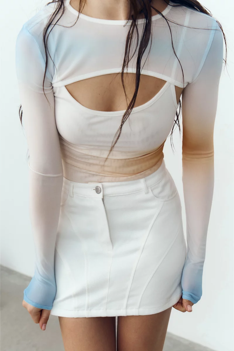 Молочная юбка мини из денима фотография 2