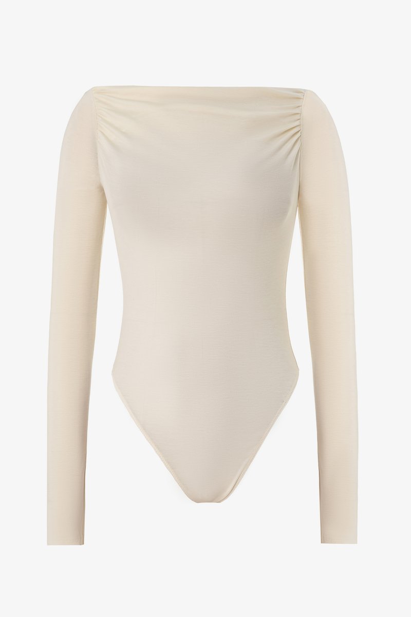 

Молочний трикотажний боді з відкритими плечима