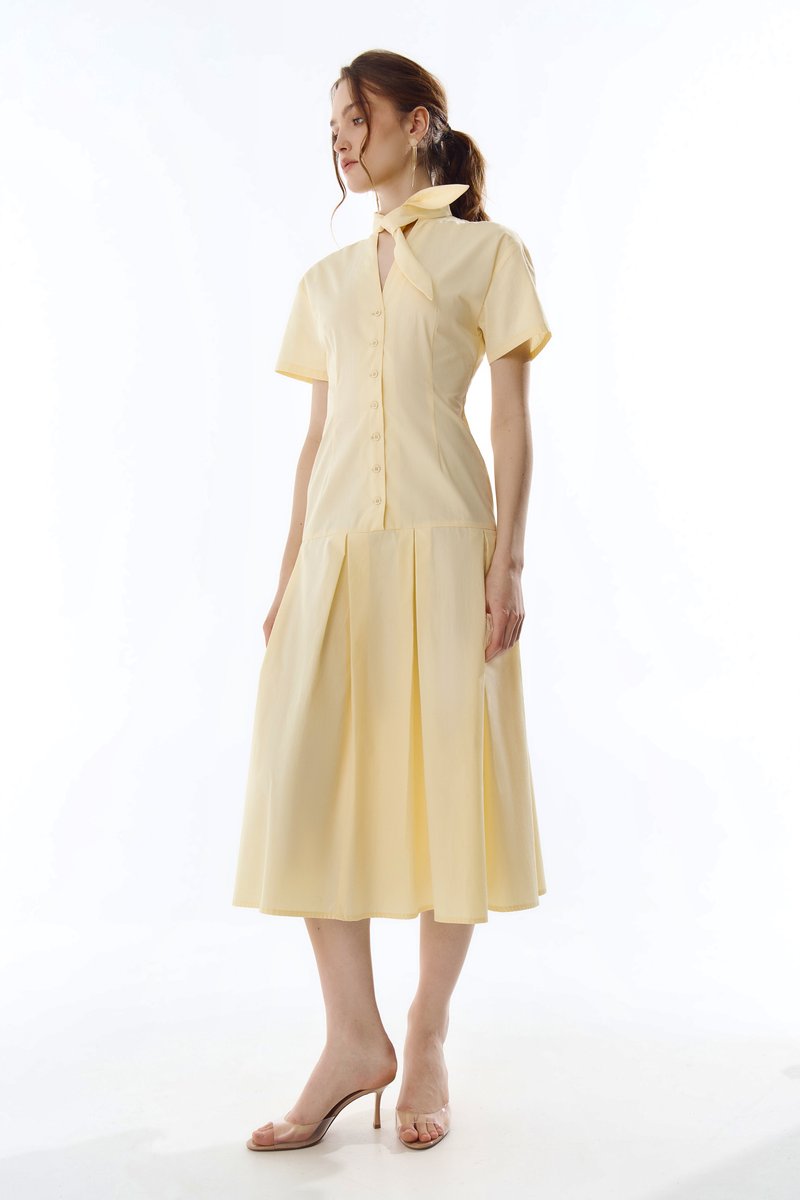 

Жовта бавовняна сукня міді з акцентною зав'язкою