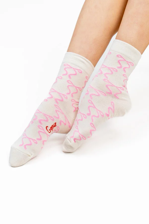 Молочные хлопковые носки с принтом бантики фотография 2