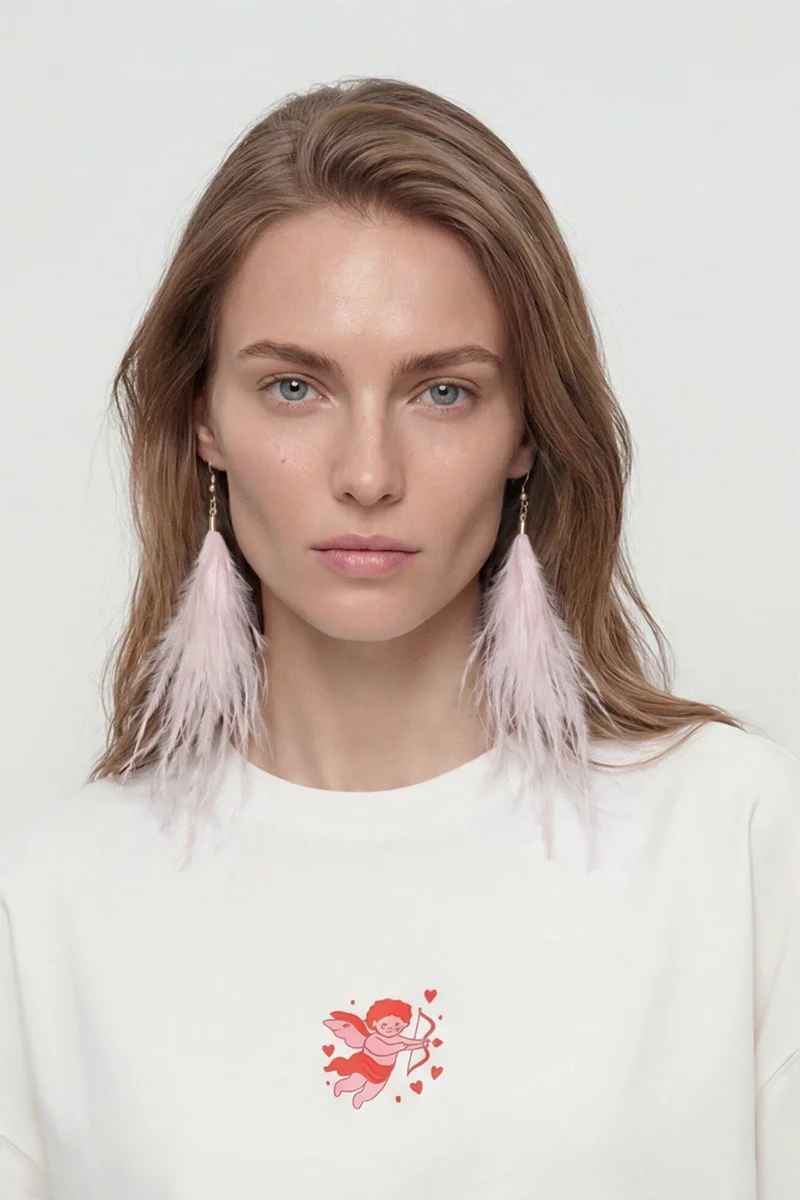 Розовые серьги с перьями фотография 1