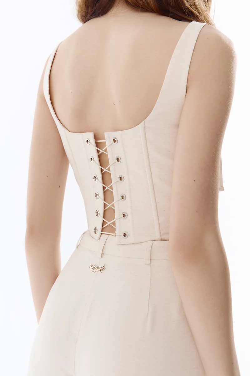 Молочний корсет на тонких бретелях фотографія 5