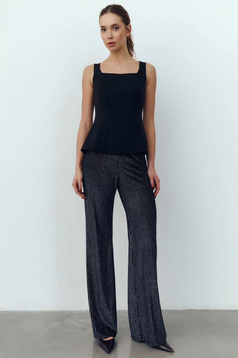 Черные бархатные брюки с серебристым напылением фотография 1