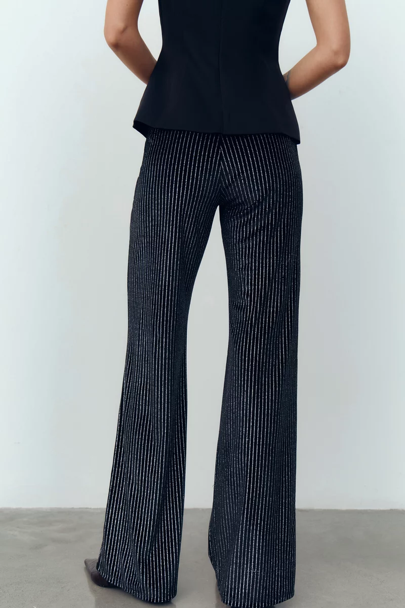 Черные бархатные брюки с серебристым напылением фотография 5