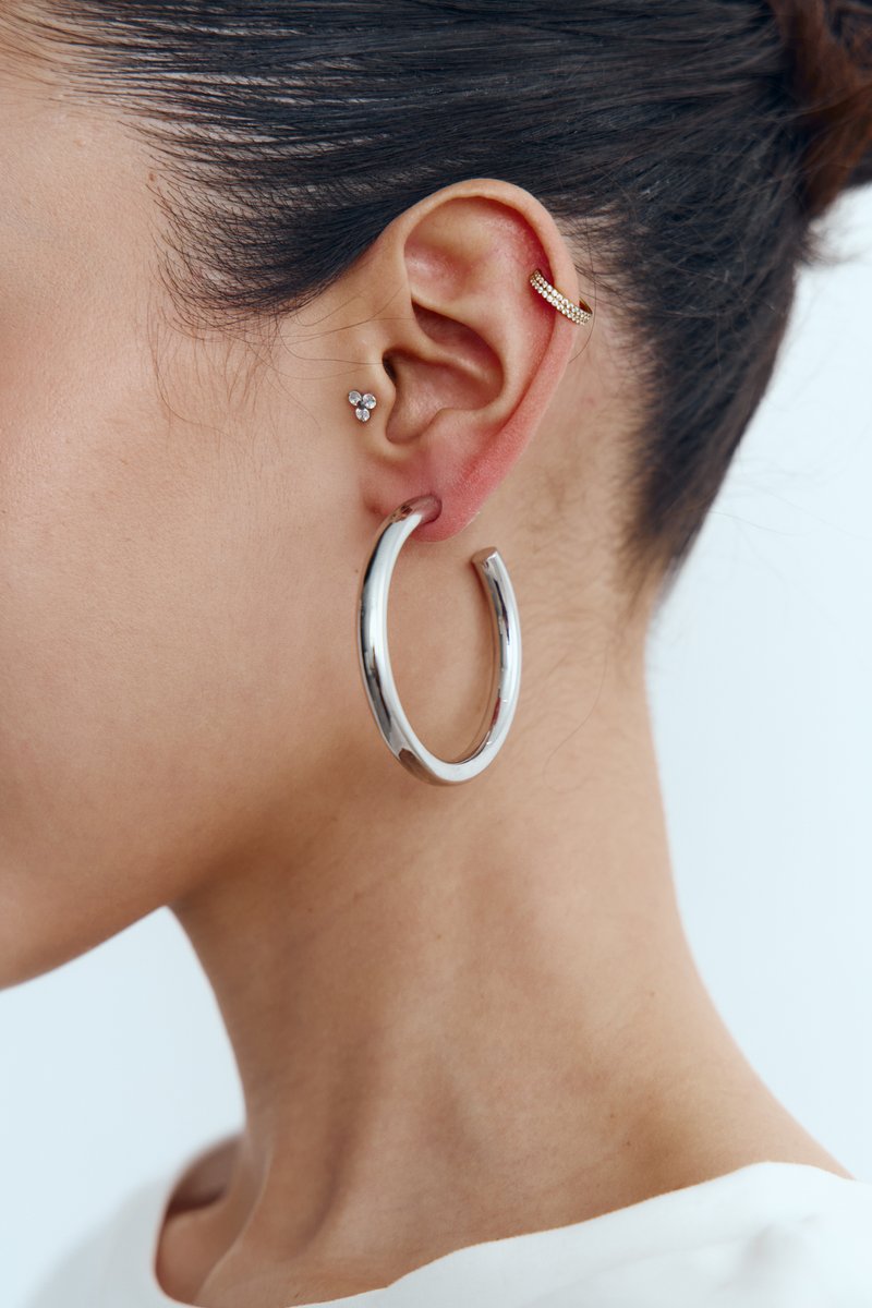 

Сріблясті сережки металік заокругленої форми