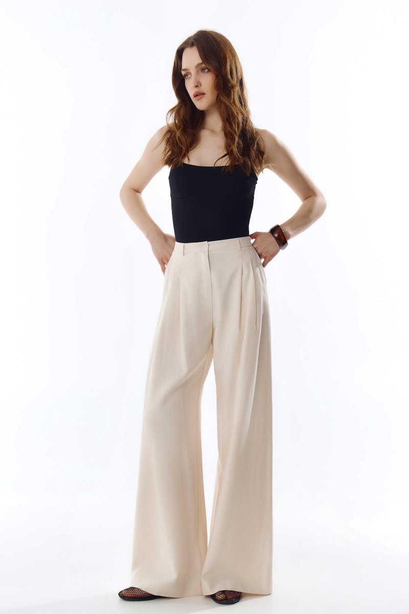 

Молочні штани-палаццо вільного прямого крою