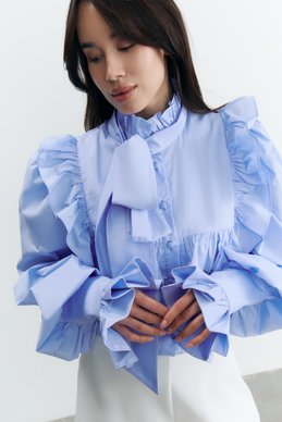 Blue cotton blouse with ruffles