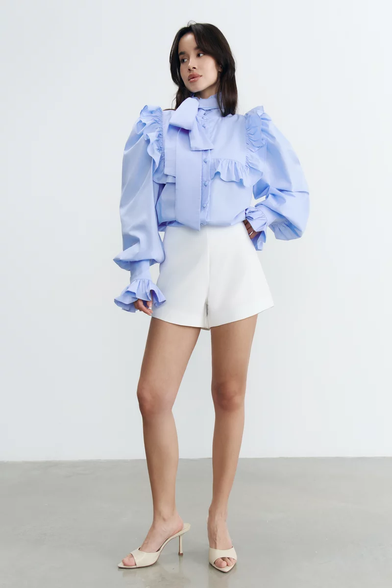 Голубая хлопковая блуза с рюшами фотография 3