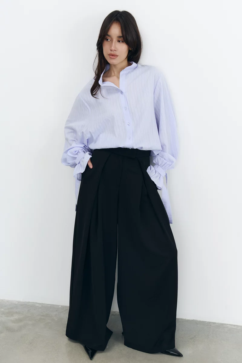 Чорні штани-палаццо з защіпами вільного крою фотографія 2