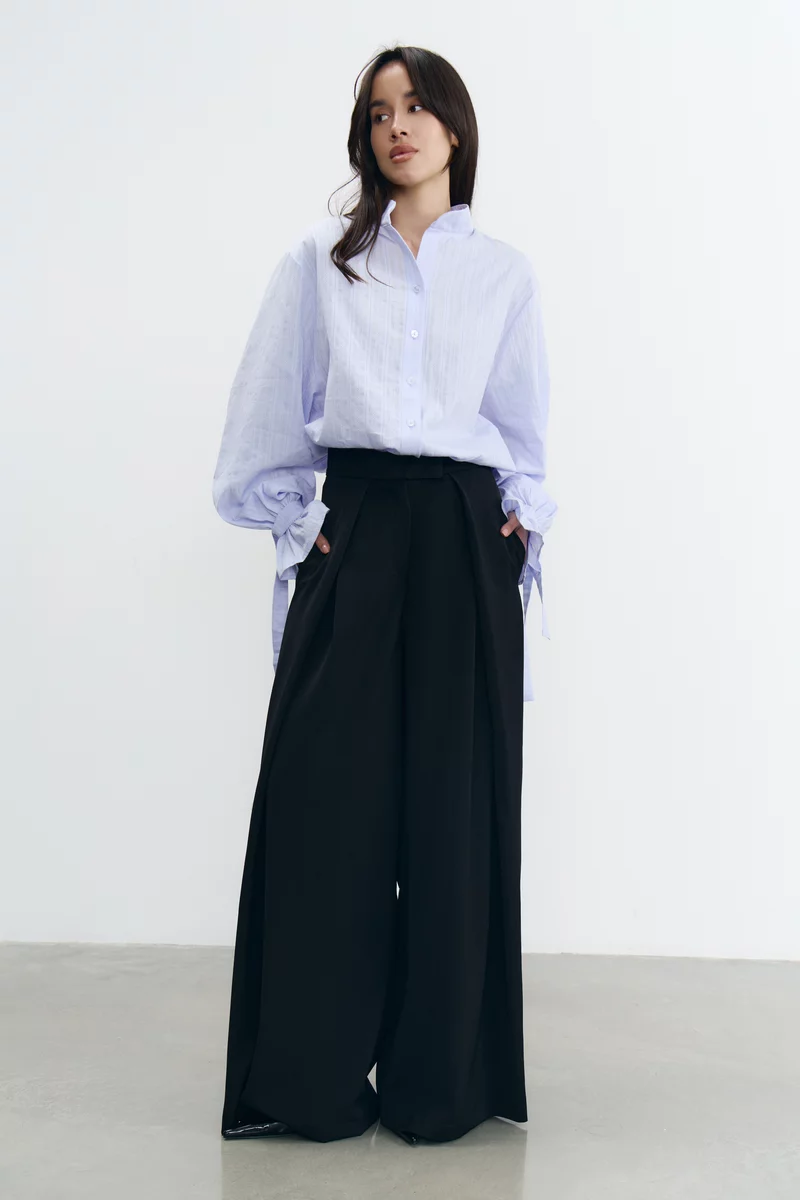 Чорні штани-палаццо з защіпами вільного крою фотографія 4