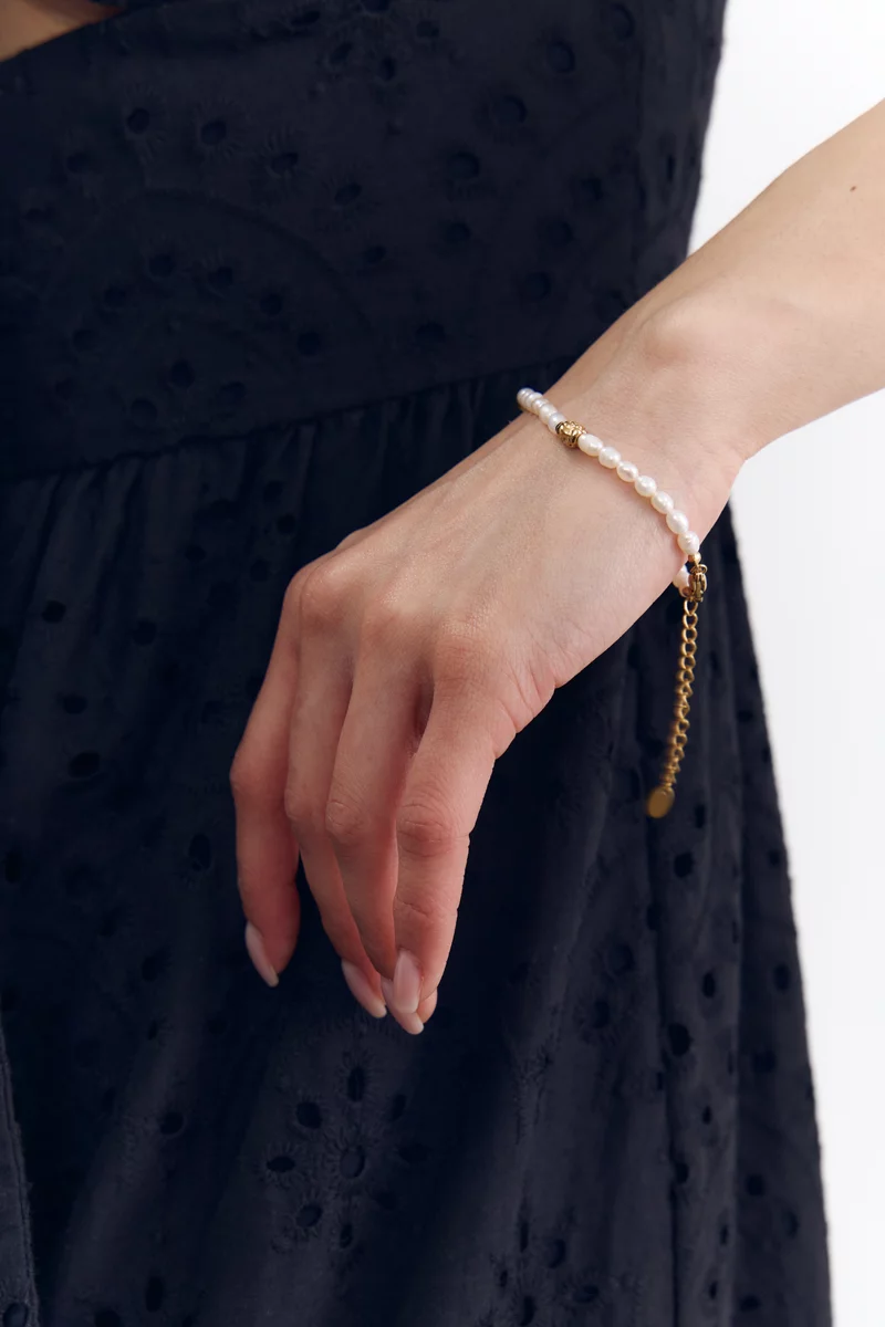 Молочный комбинированный браслет с жемчугом фотография 1