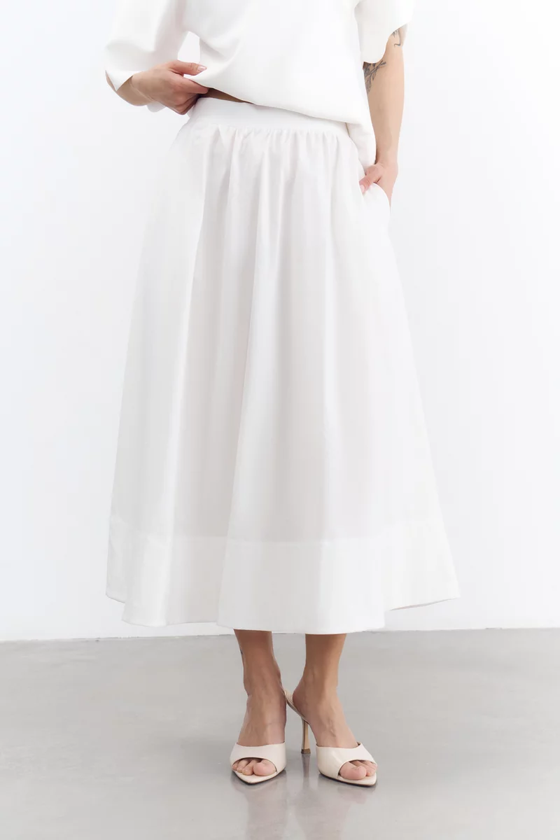 Молочна бавовняна спідниця міді фотографія 3