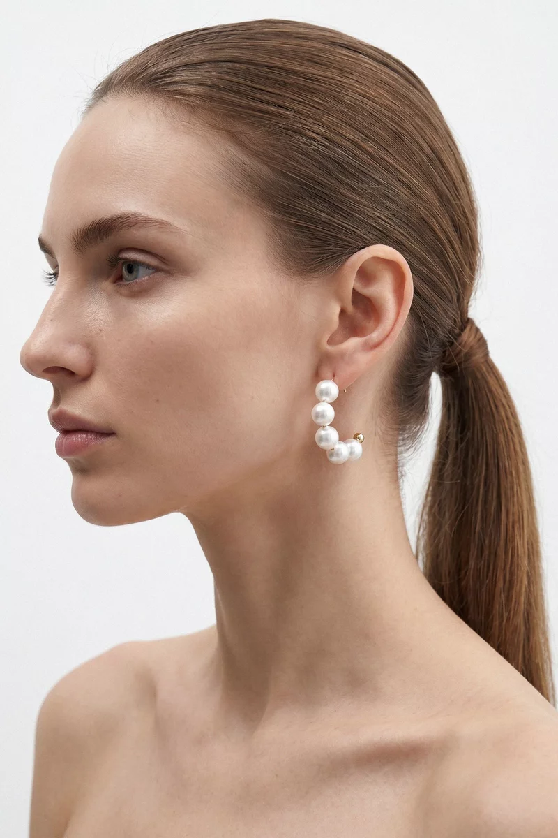 Milky pearl earrings with gold hardware photo 1