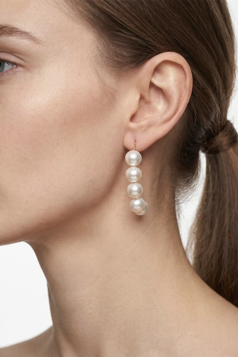 Milky pearl earrings with gold hardware photo 2