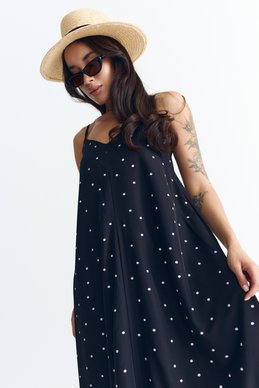 Black maxi dress with thin straps and polka dot print